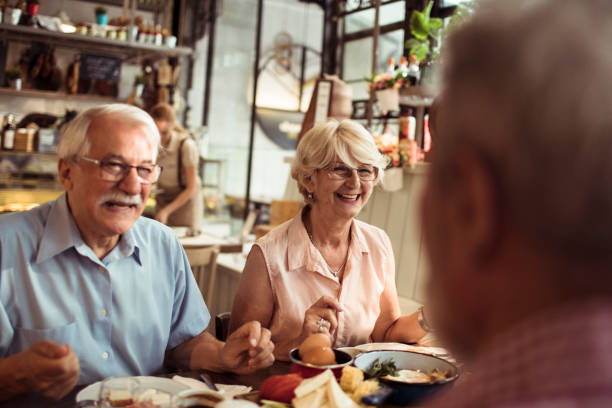istock Seniors enjoying a lunch together at a local small restaurant 1490837729