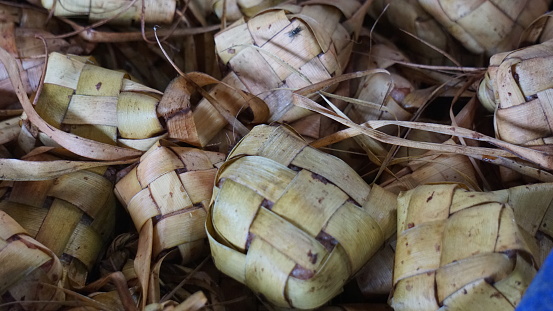 Ketupat is a typical Indonesian dish made of rice, wrapped in coconut leaves and boiled in hot water and usually eaten on idul fitri