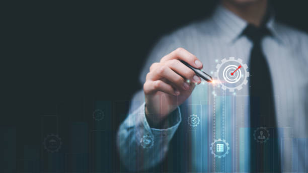 istock businessman showing business goal setting concept,Target Growth development planning,Organizational growth and objectives , marketing strategy planning,improving business objectives ,business partner 1490840047