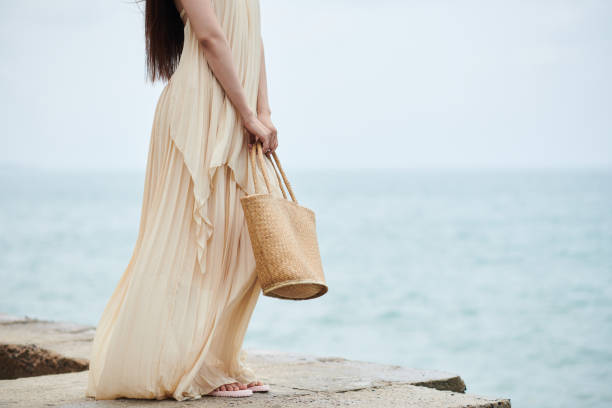 istock Woman Standing on Beach 1490844274
