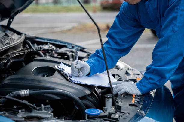 istock Mechanic repairing car 1490847002