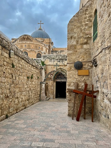 Crosses in the Via Dolorosa in Jerusalem with view towards the Church of the Holy Sepulchre