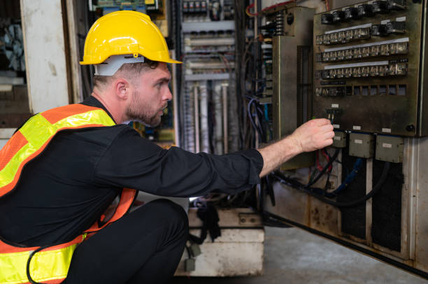 istock The engineer inspects the electrical system and repairs the mechanical system in the machine control cabinet 1490850419