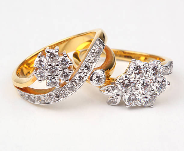 istock Two style of golden ring with diamond isolated on white 149086506