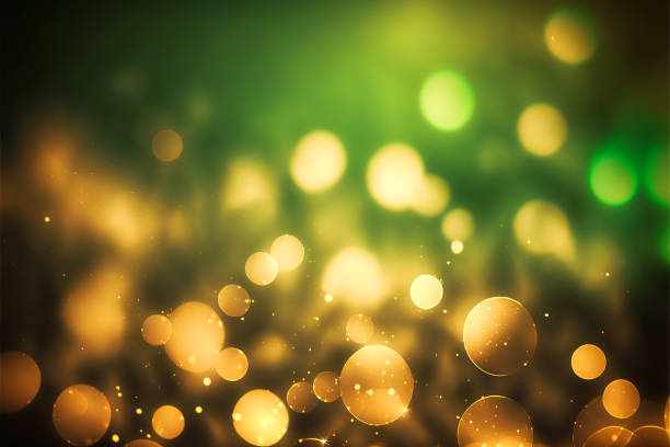 defocused glitter green gold bokeh abstract background with bokeh lights vintage lights background.for celebration background stock photo