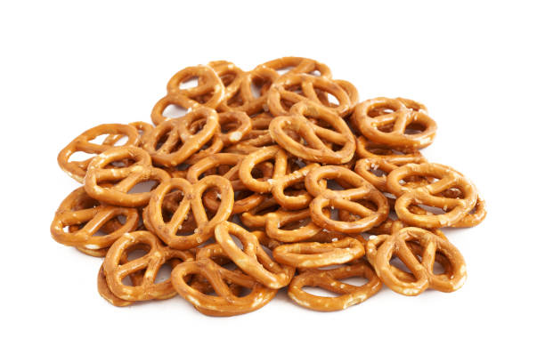 istock mini salted pretzel isolated on white background. mini salted cracker pretzel isolated on white background. salty, mini snack, appetizer, pretzel isolated 1490867537