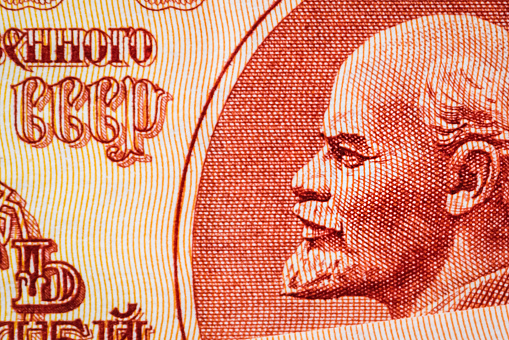 Fragment of a 10 ruble bill of the USSR with the image of Vladimir Lenin.A Lenin's portrait on old Soviet ruble banknote.10 ruble bill of USSR.