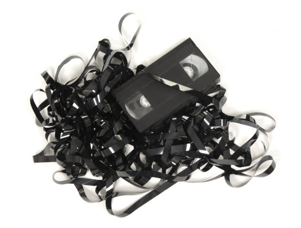 broken video tape isolated on white background - unusable imagens e fotografias de stock