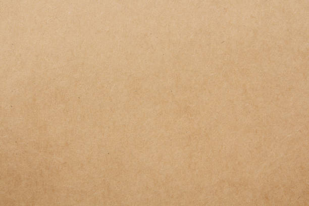 istock Cardboard sheet texture background, pattern of brown kraft paper with vintage style. 1490877283