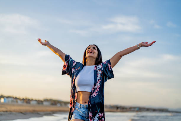 istock Woman Greeting the Sun 1490881881