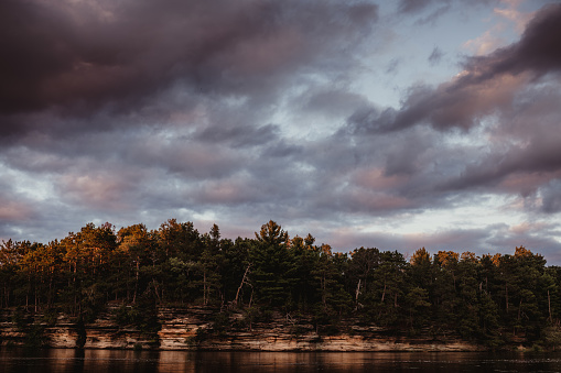 Wisconsin dells river with clouds and sunset