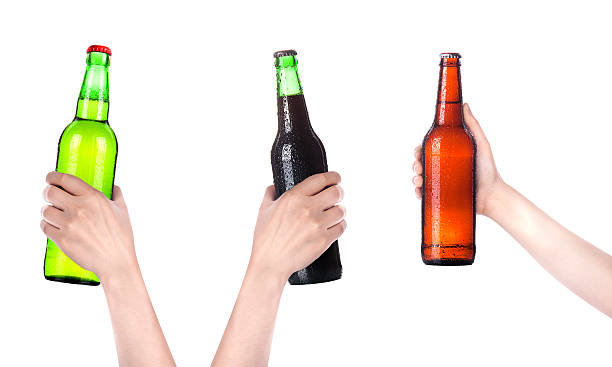istock collection of isolated hands with beer bottle making a toast 149088722