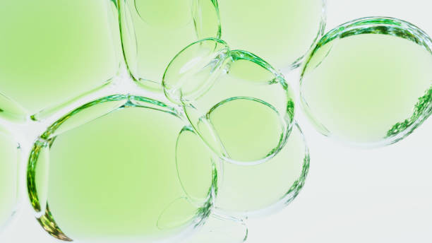 istock Beautiful transparent green bubbles, clean abstract 3D rendered background 1490890032
