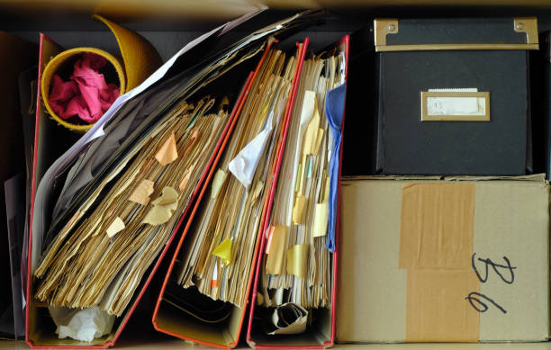 istock messy file folders,red tape, bureaucracy,aministration,business concept. 1490893388