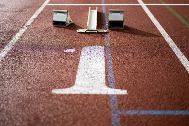 istock Running track starting line with number one 1490896066