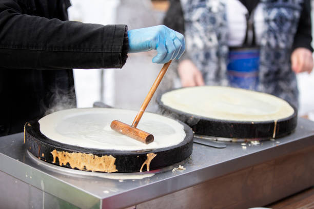 istock Pour the pancake batter into the skillet. Prepare pancakes. 1490896129