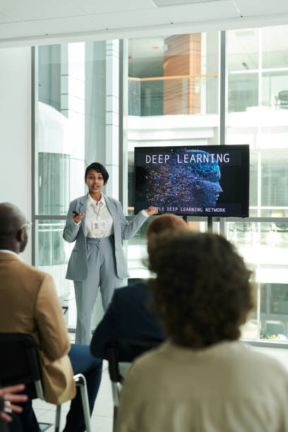 istock Long shot of young confident lecturer explaining point of presentation 1490896249