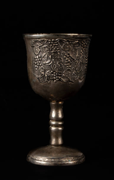 istock Antique silver royal goblet with grape engraving. 1490896508