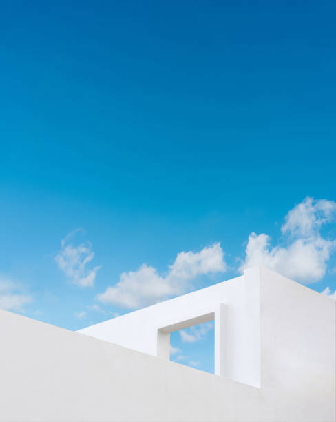 istock Wall concrete texture with open window against blue sky and clouds, White paint cement building, Ant view Exterior Modern architecture with open door on roof top in Spring,Summer sky 1490896732