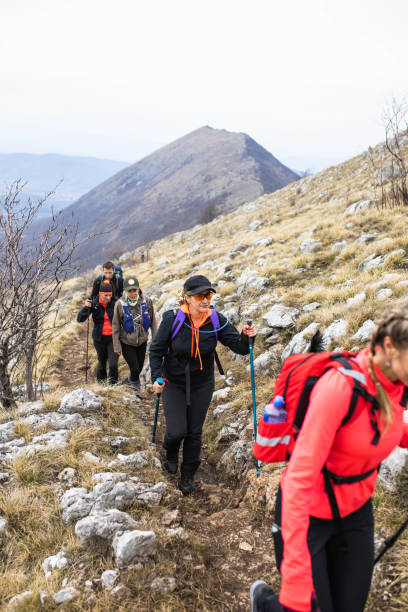 istock A group of hikers getting close to the summit 1490902218