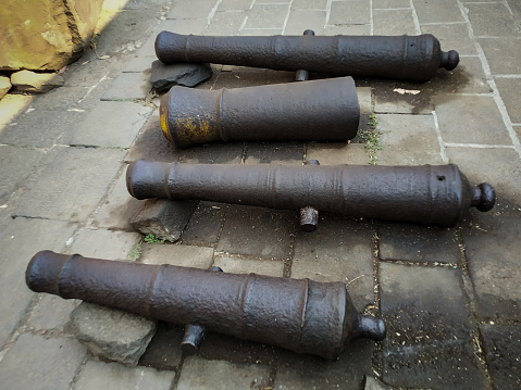 Ancient cannons on Lohgad fort, Maharashtra, India