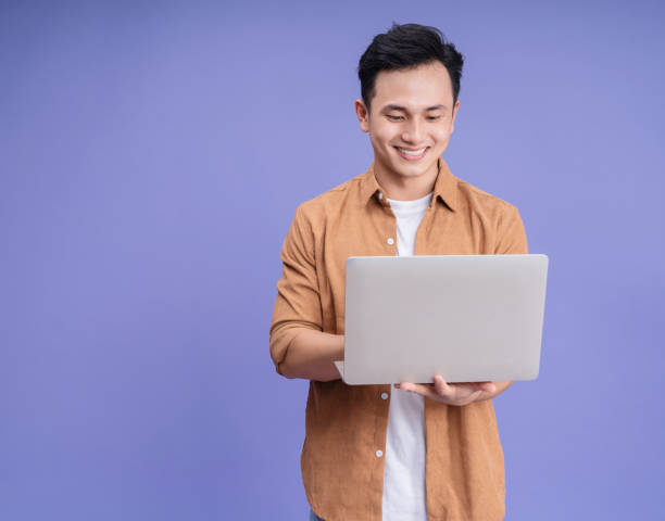 istock Photo of young Asian man on background 1490903016