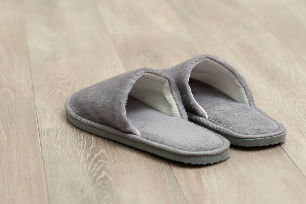 istock Close up of gray slippers on the floor 1490907021