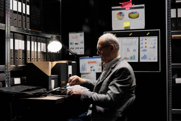 istock Elderly businessman leaving workplace 1490907104