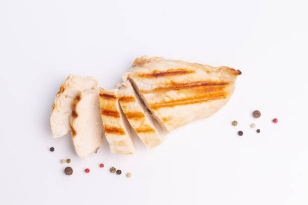istock Grilled chicken breast isolated on white background. 1490907541