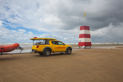 Wadden Sea National Park, Denmark - August 11,2018: Coastguard on the Lakolk beach after heavy rain,Jutland, Denmark. This beach is favorite for kiteboarding, surfing etc.