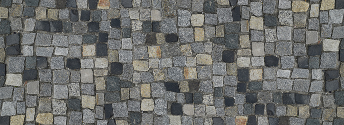 Portuguese Stone Pavement or Calcada Portuguesa Granite Cobblestone Road Top View. Mosaic Brick Cobblestoned Floor with Tiles and Small Stones