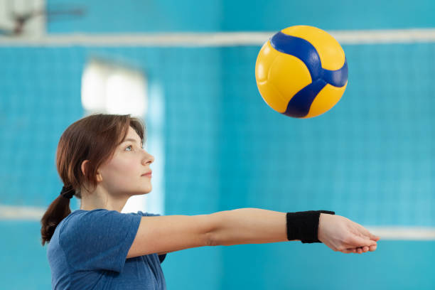 istock Female player learning fundamental skills in volleyball 1490911899
