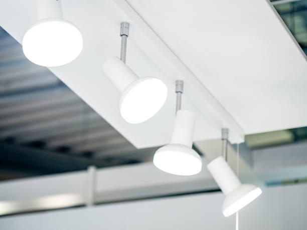 istock Group of white LED lights on the ceiling. Lighting design for home decoration 1490912899