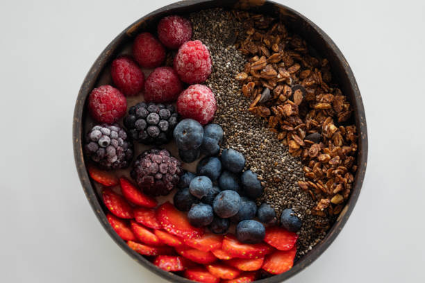 istock Smoothie bowl with fresh berries and granola 1490913322