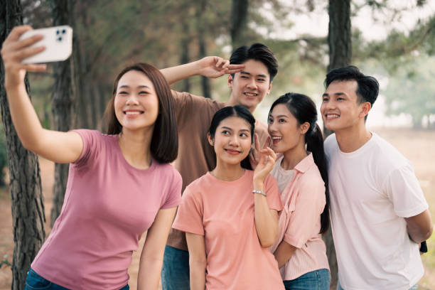 istock Group Asian people picnic outside 1490914214
