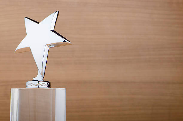 istock Star award against wooden background 149091527