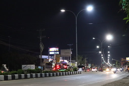 Tegal, Indonesia - April, 2023 : Long exposure photo of light trails on the street in Indonesia