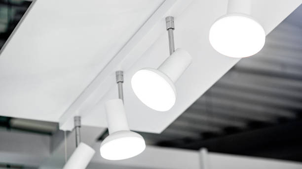 istock Group of white LED lights on the ceiling. Lighting design for home decoration 1490916569