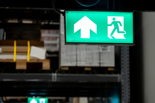 Warehouse Racking Exit Sign Emergency Exit Sign Or Fire Exit Sign Hanging On Rack Structure In ...