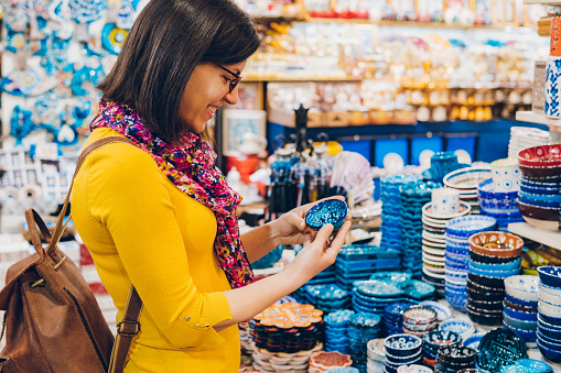 Woman shopping in bazaar market, Istanbul