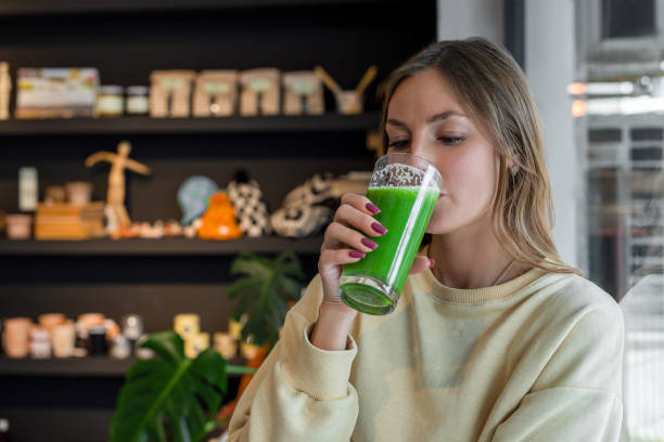 istock Woman drinking detox juice 1490918059
