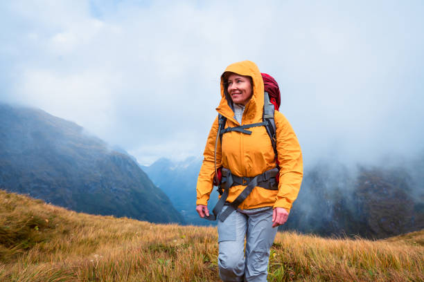 istock Solo hiker outdoors at Milford Track. 1490918603