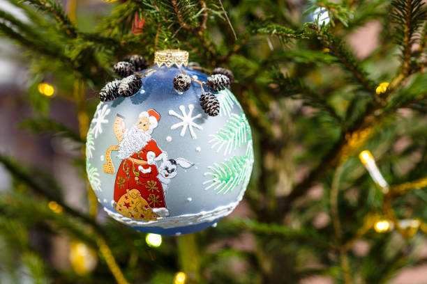 istock painted glass ball with santa claus on xmas tree 1490918874