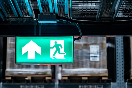 Warehouse Racking Exit Sign Emergency Exit Sign Or Fire Exit Sign Hanging On Rack Structure In ...