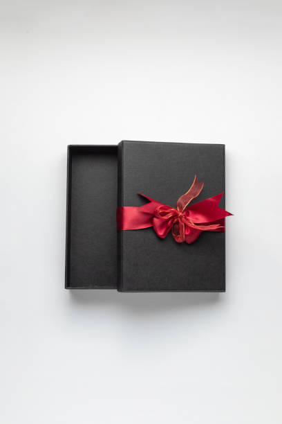 istock Beautiful gift box on color background 1490922467