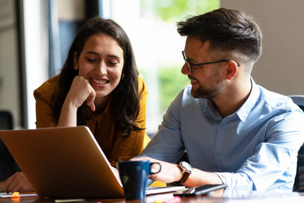 istock Colleagues working together in office. 1490926223