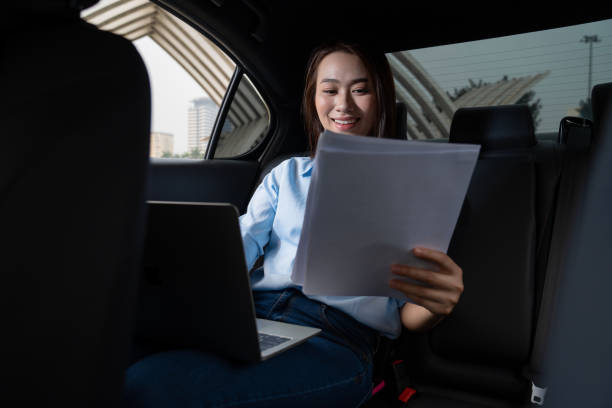 istock Young Asian woman with car 1490928036