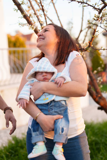 Newborn baby with family