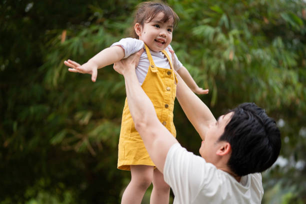 istock Image of young Asian father and daughter 1490935533