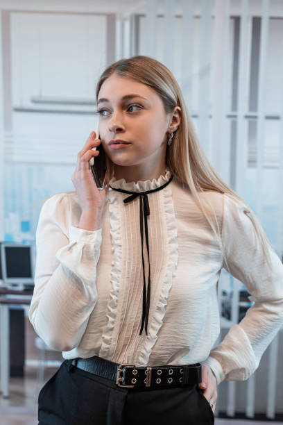 istock Young businesswoman use smart phone at office 1490939893
